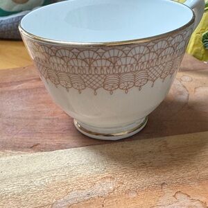 Elegant White and Brown Patterned Teacup